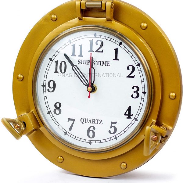 Nagina International 9" Antique Brass Finished Premium Nautical Wall Decor Vintage Time's Clock | Pirate's Porthole Decorative Clock (Quart'z Roman Dial)